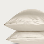 Two bamboo pillowcases on a light gray background