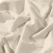 A close view of a button and lining on the flannel duvet cover.