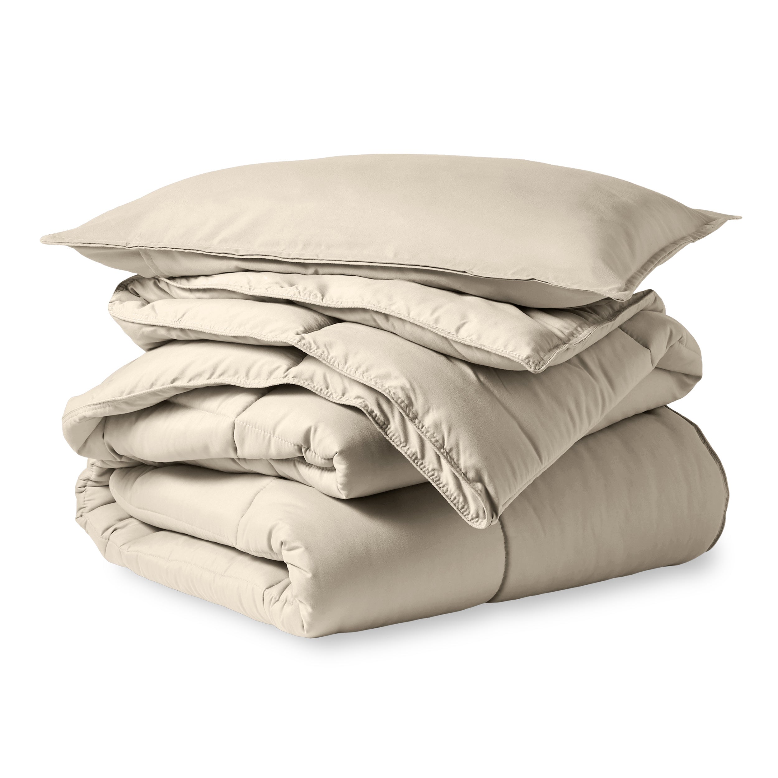 A microfiber comforter folded neatly with a pillow from above