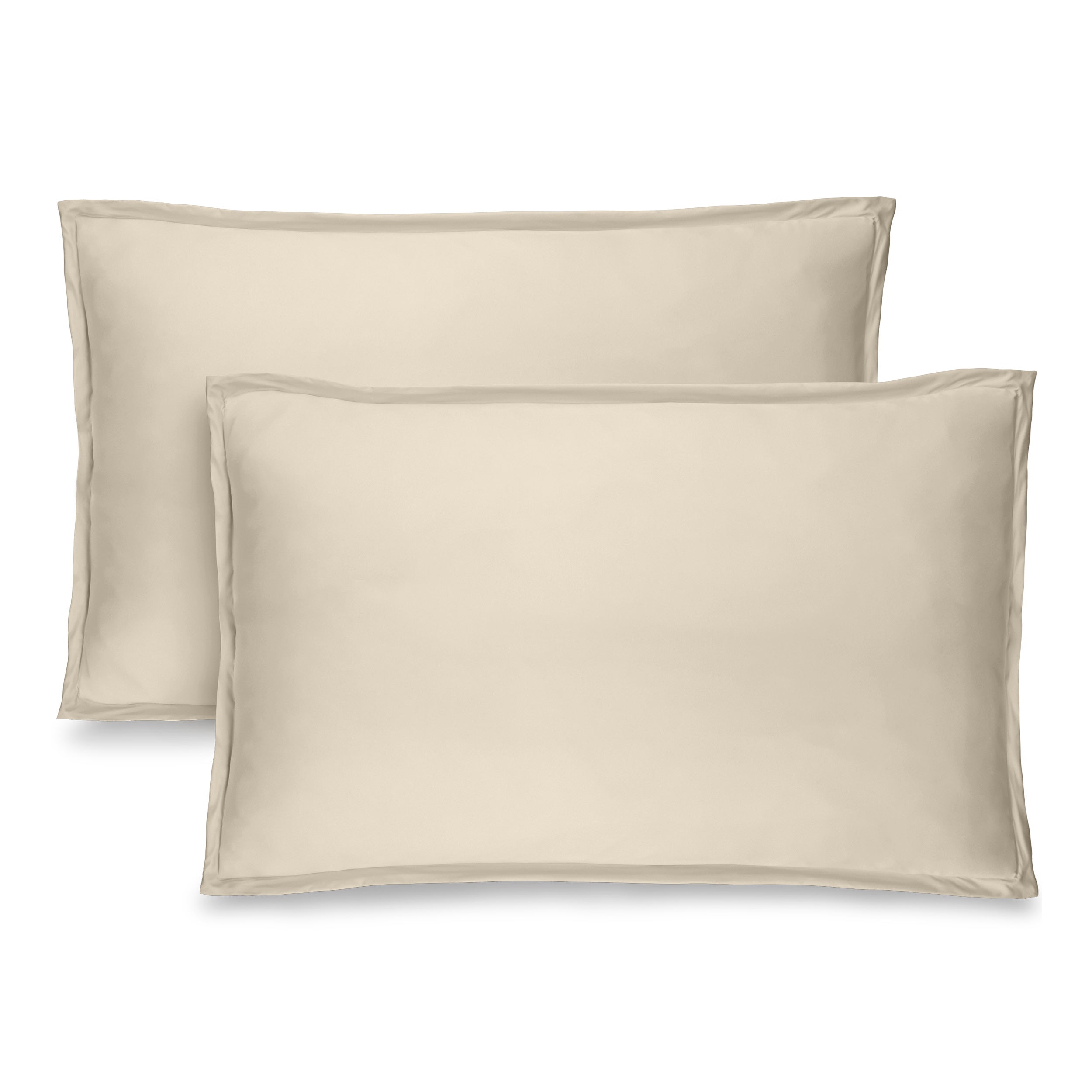 Two pillow shams on pillows standing up with one behind the other