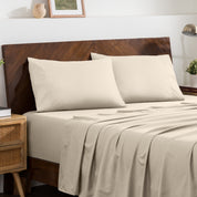 2 pillowcases on pillows on a nicely made bed
