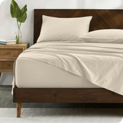 Percale sheets on bed in a modern bedroom