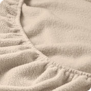 A close view of a polar fleece fitted pocket showing the texture.