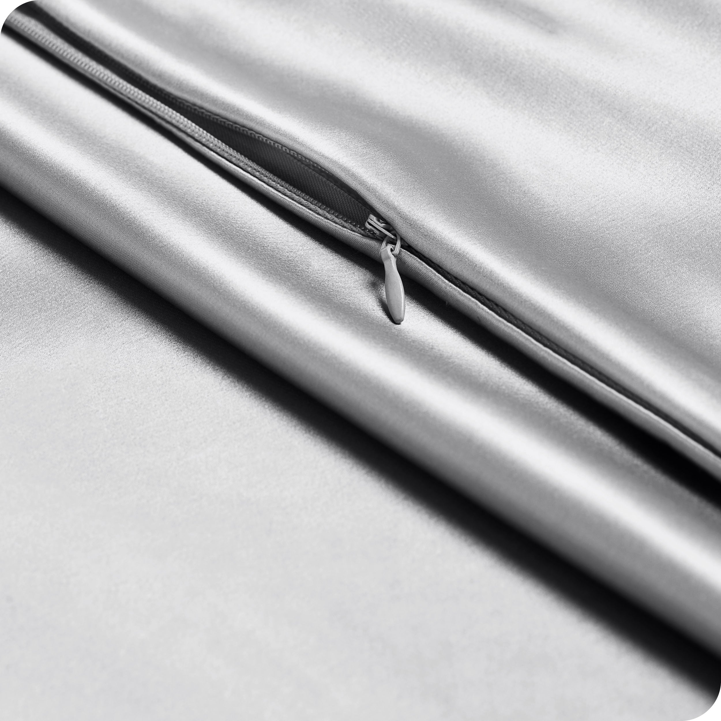 Zipper on a satin pillowcase