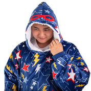 An adult with a sherpa wearable blanket on