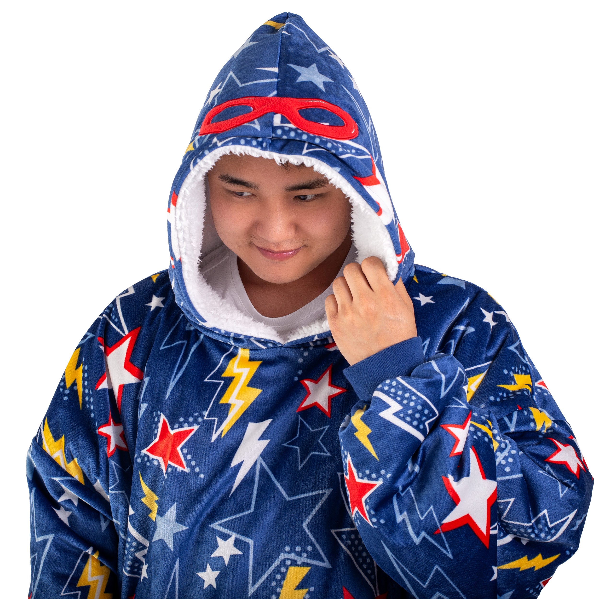 An adult with a sherpa wearable blanket on