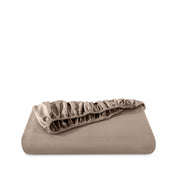 Fitted sheet neatly folded on a white background