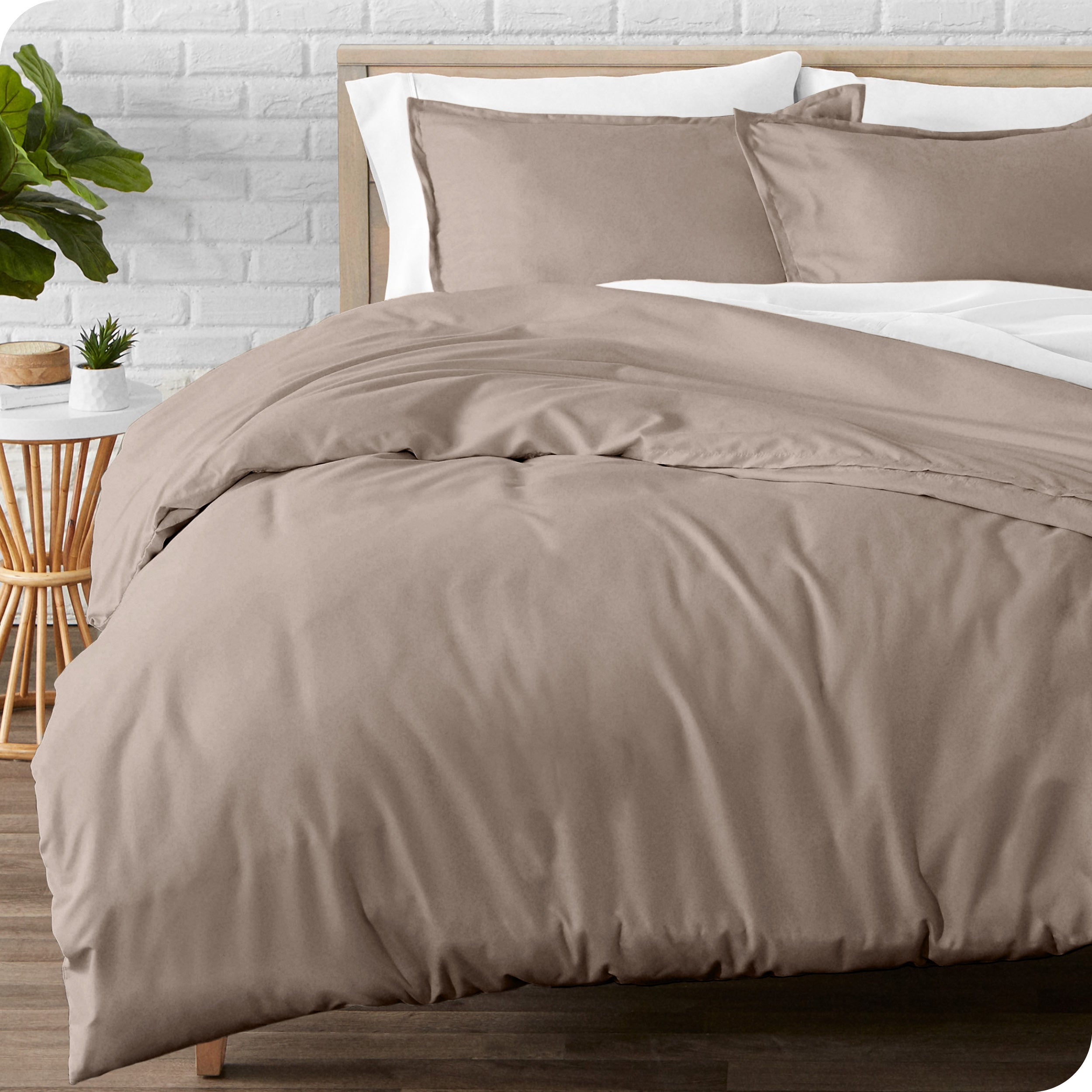 A modern bed with a flannel duvet cover set consisting of the duvet cover and two pillows.