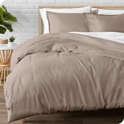 A modern bed with a flannel duvet cover set consisting of the duvet cover and two pillows.