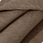 A close up of a corner of the microfiber comforter

