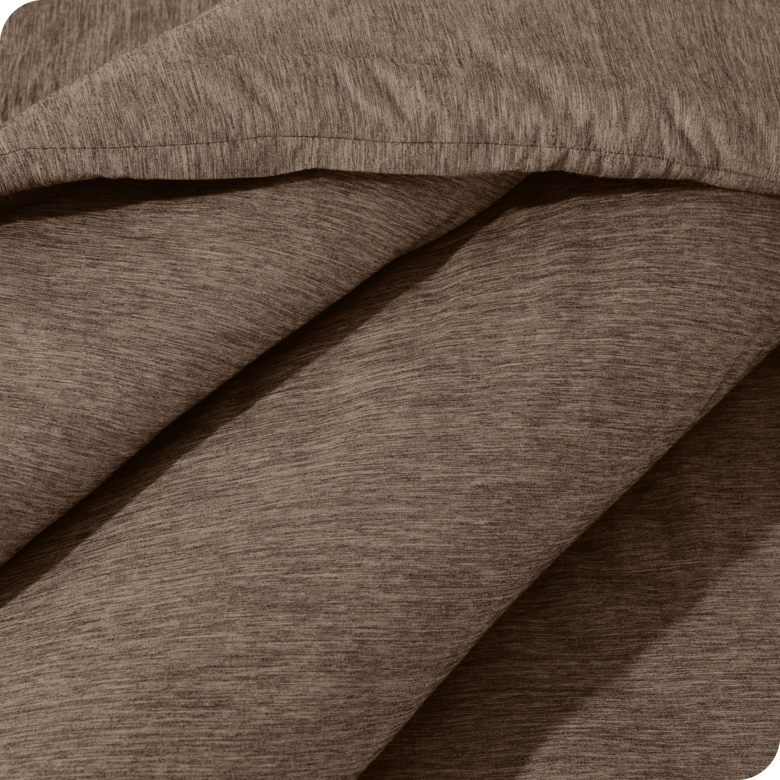 A close up of a corner of the microfiber comforter

