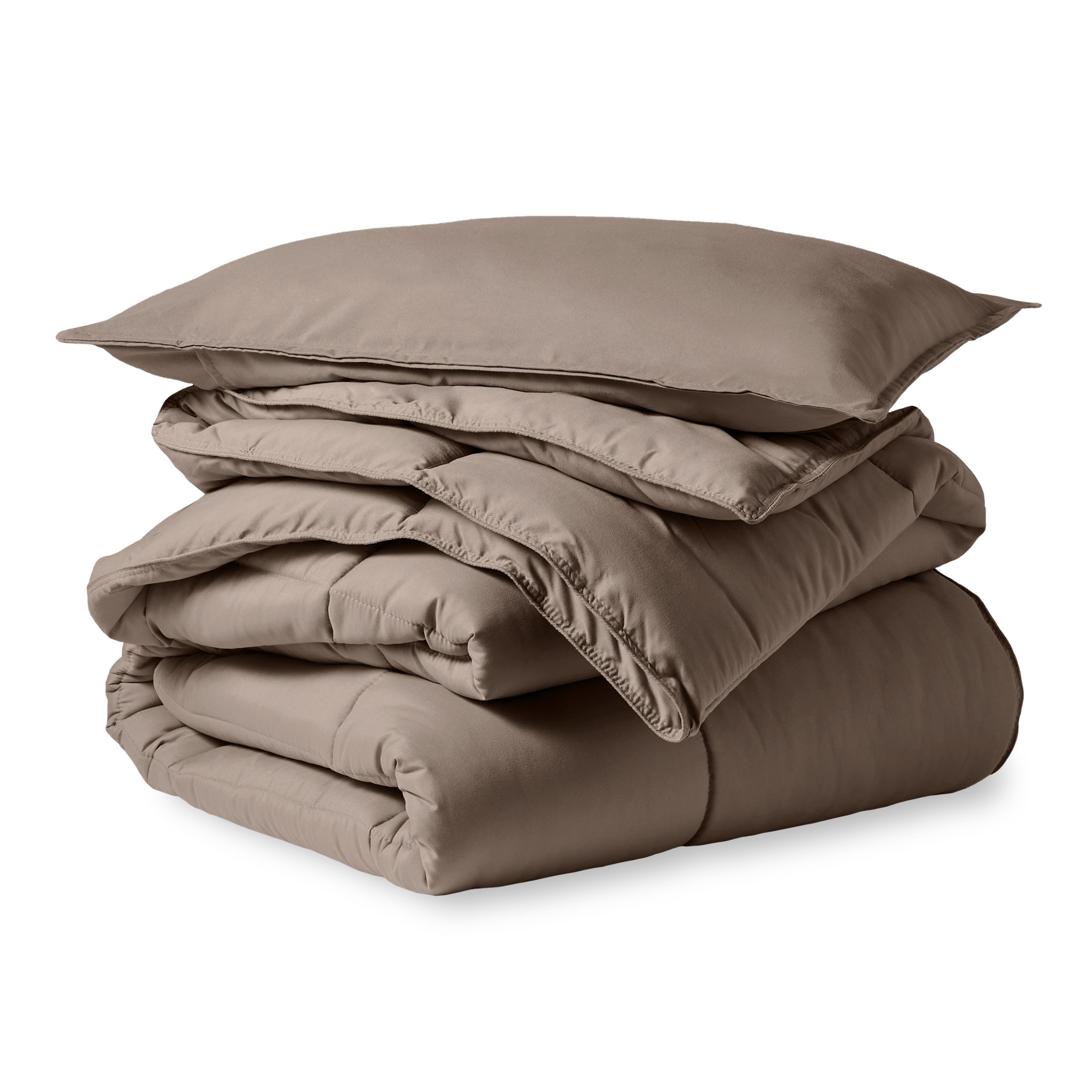 A microfiber comforter folded neatly with a pillow from above