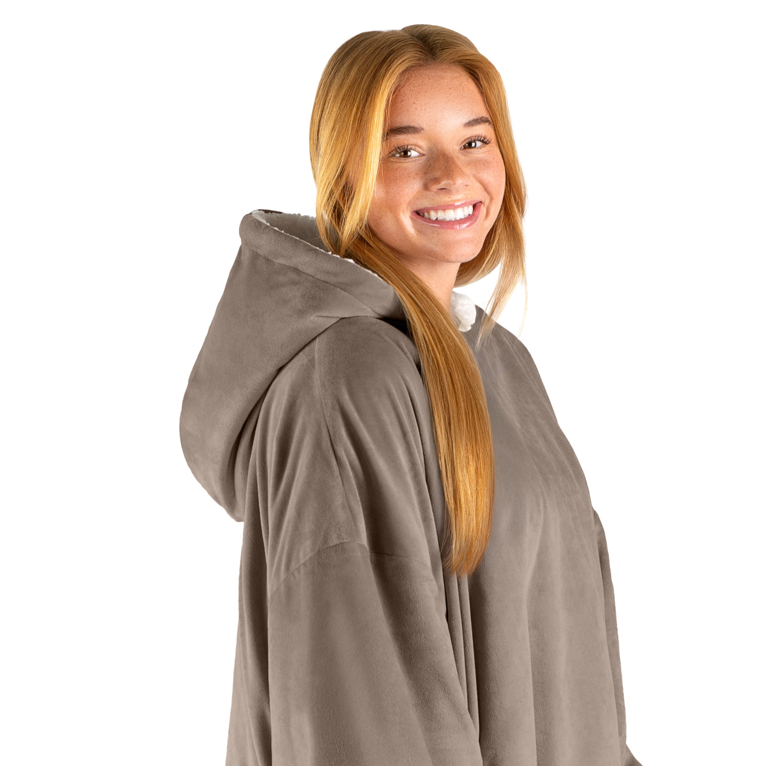 An adult with a hooded wearable blanket on