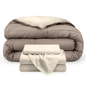 A reversible microfiber comforter and a coordinating sheet set folded and stacked 