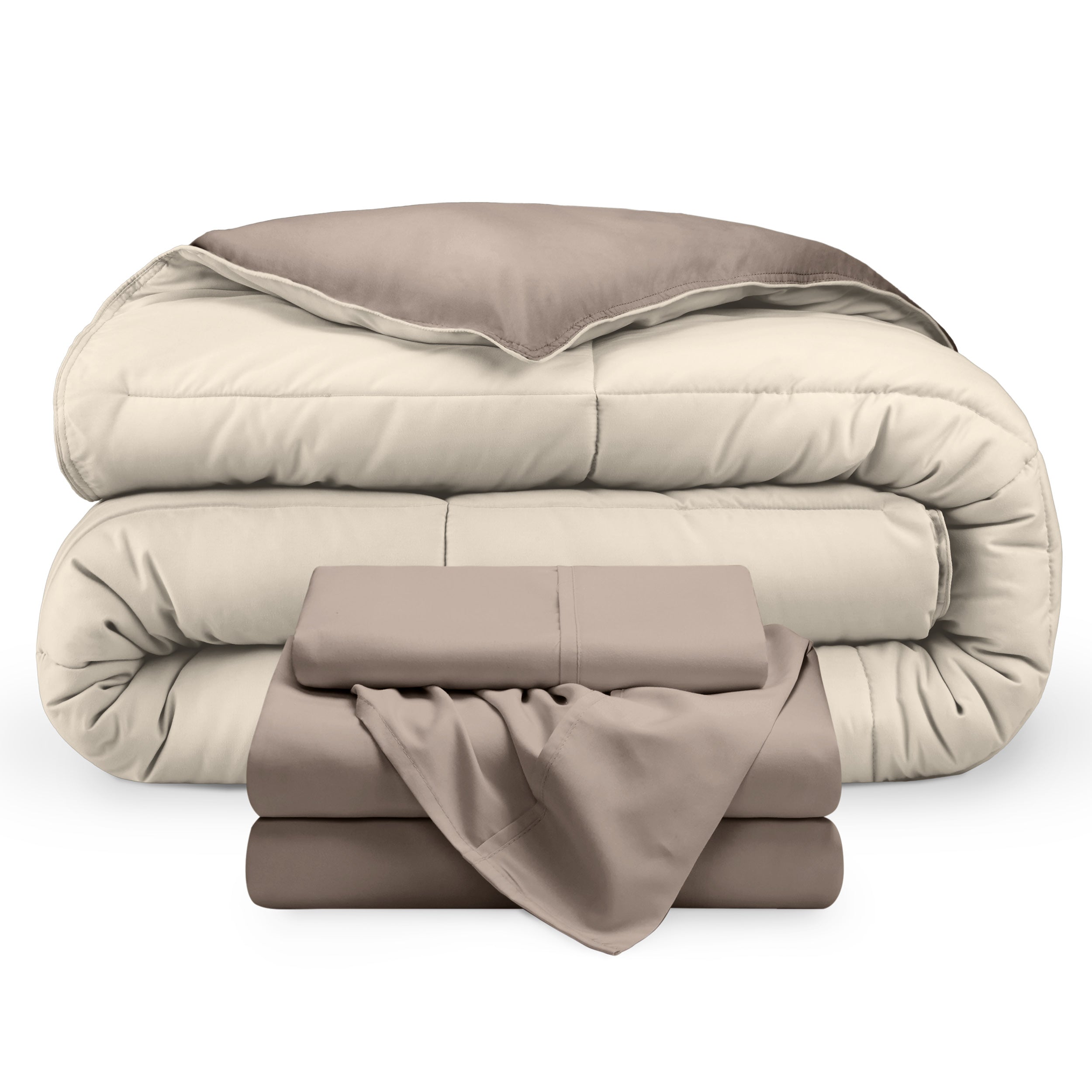 A reversible microfiber comforter and a coordinating sheet set folded and stacked 