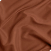Close up of a duvet set to show the material and the color