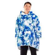 An adult with a sherpa wearable blanket on