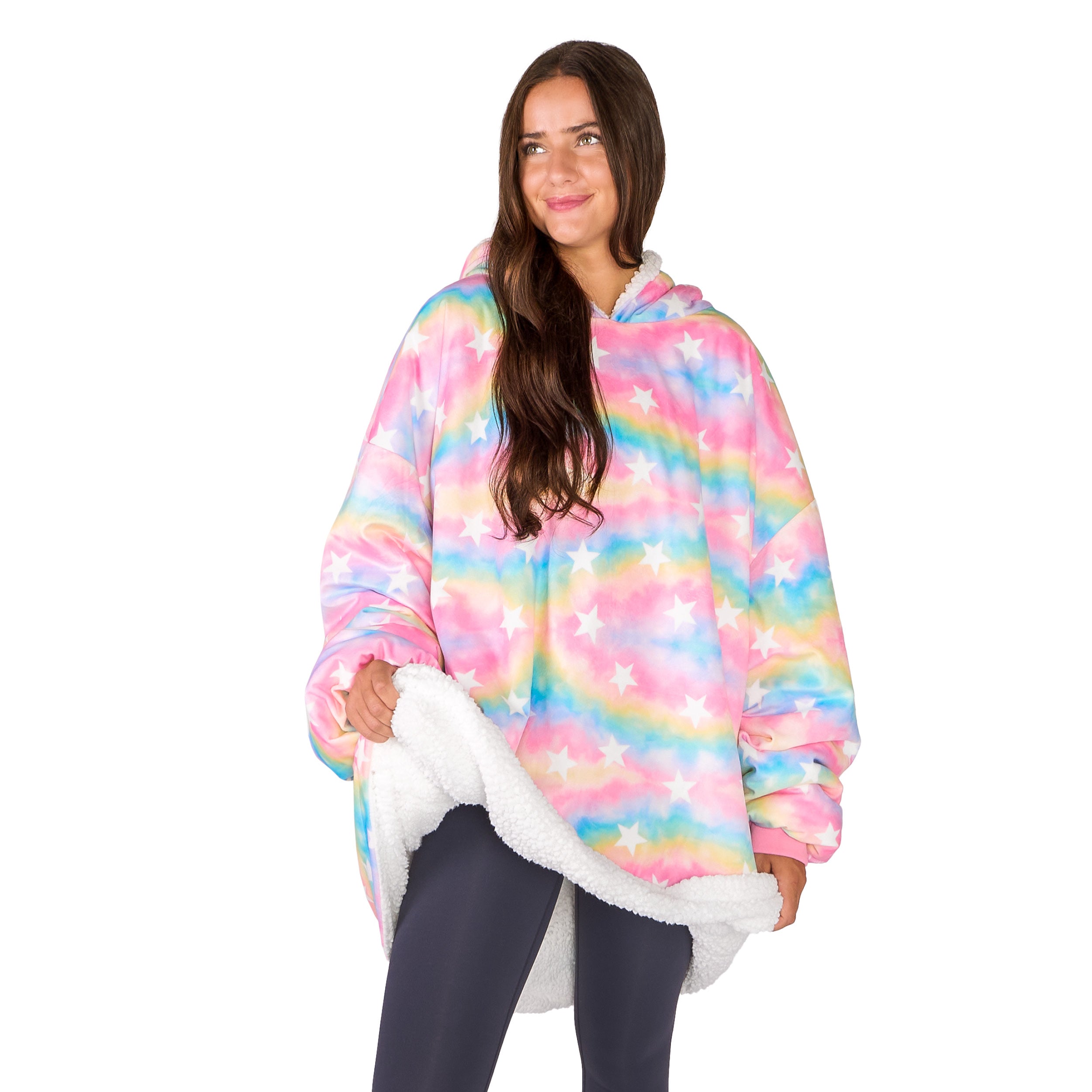 An adult with a sherpa wearable blanket on