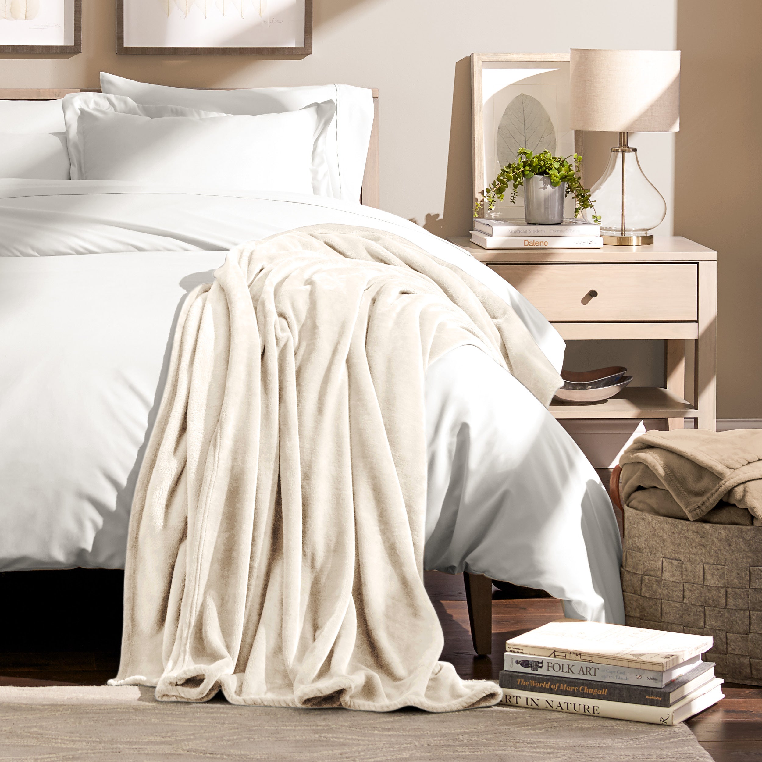 Microplush blanket laid out over a bed and folded back over itself