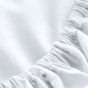 Close up of the elastic on a fitted sheet