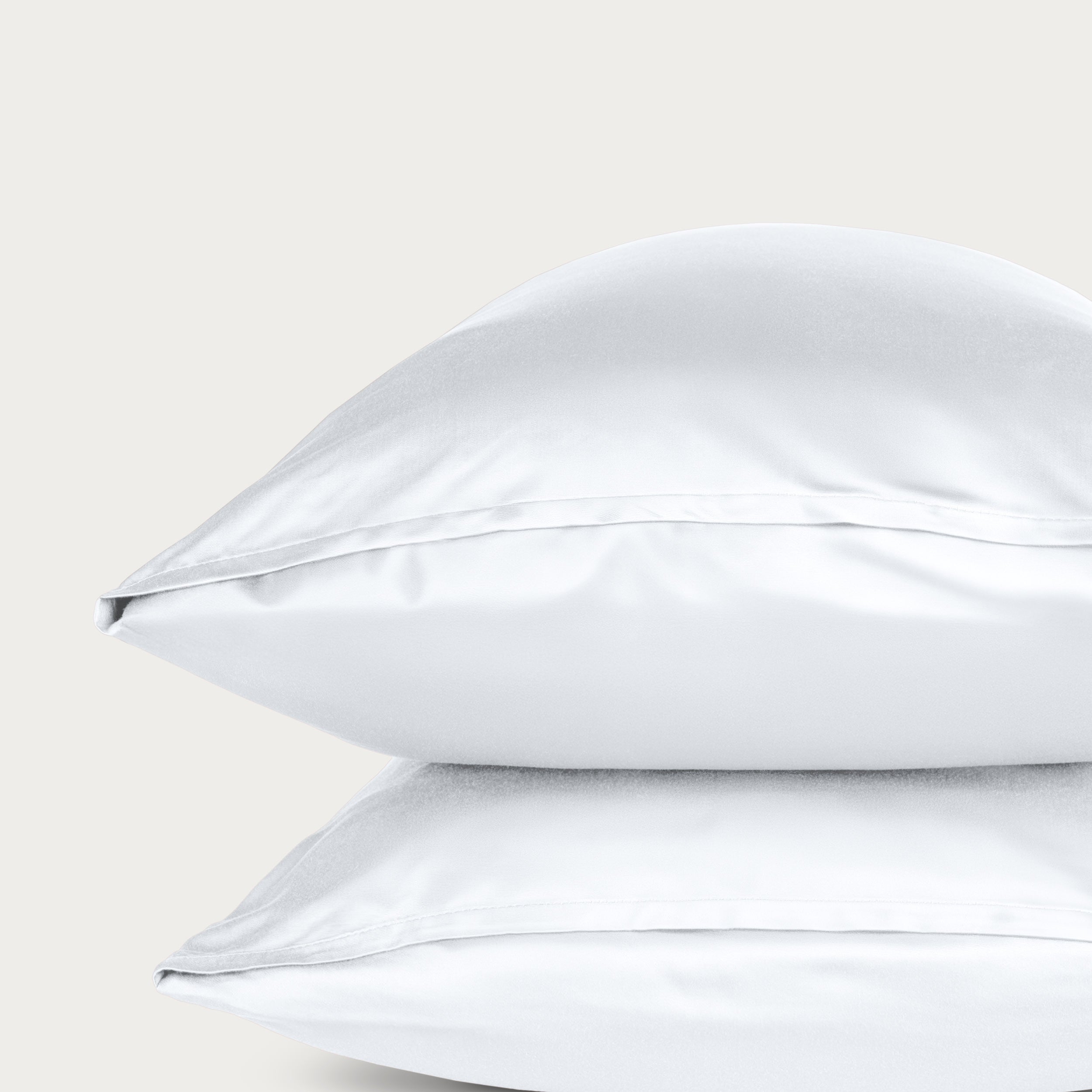 Two bamboo pillowcases on a light gray background