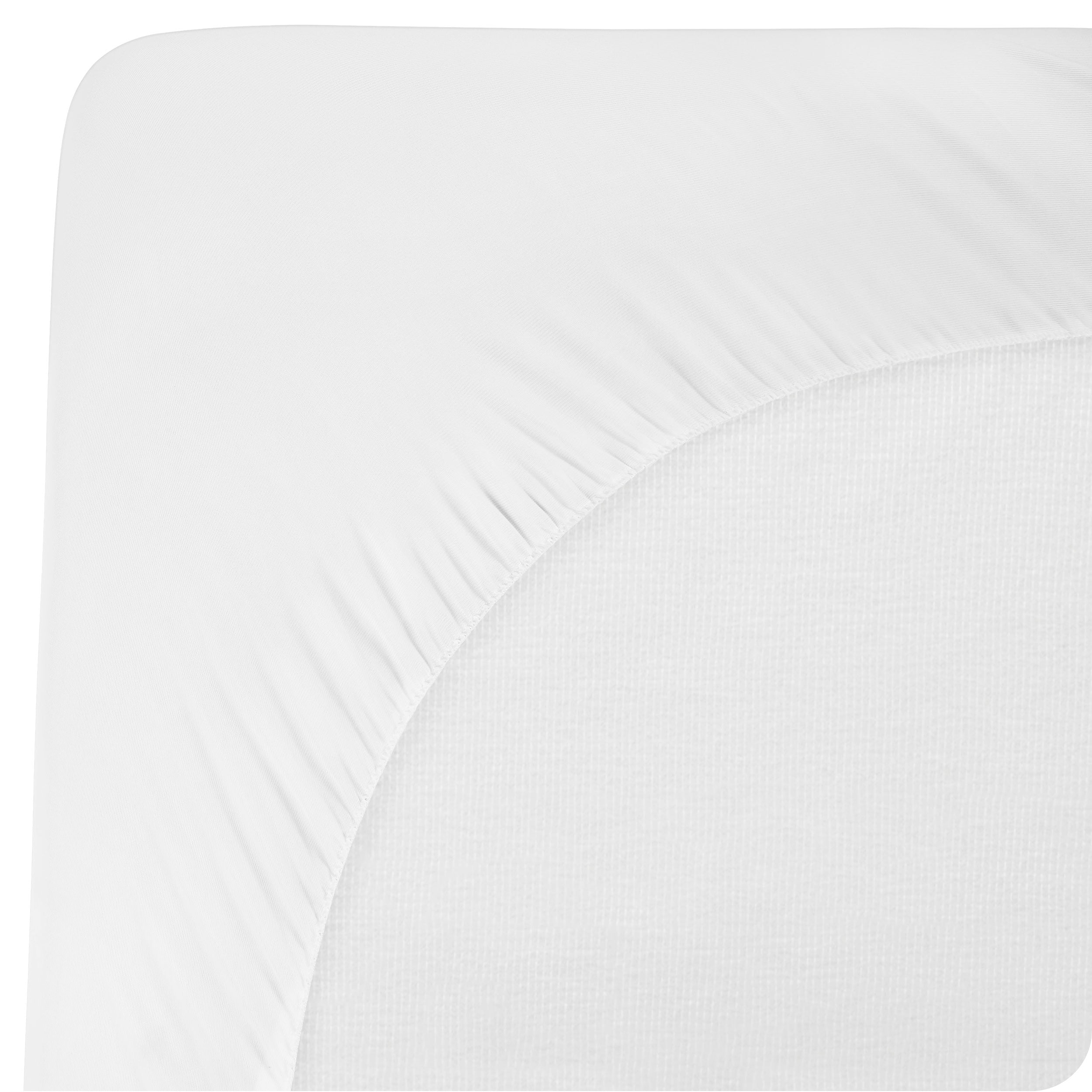 The back of a mattress with a mattress pad on it