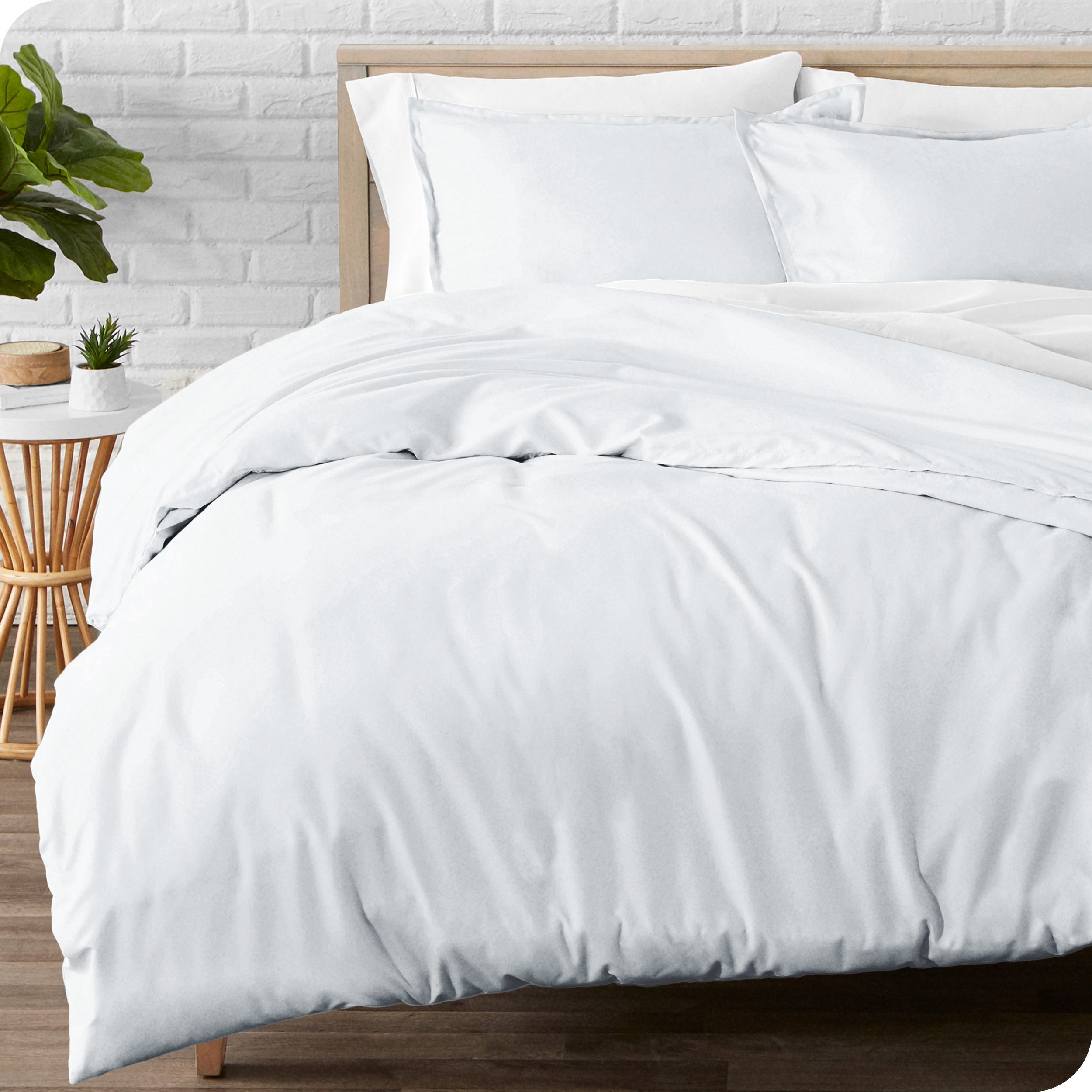 A modern bed with a flannel duvet cover set consisting of the duvet cover and two pillows.