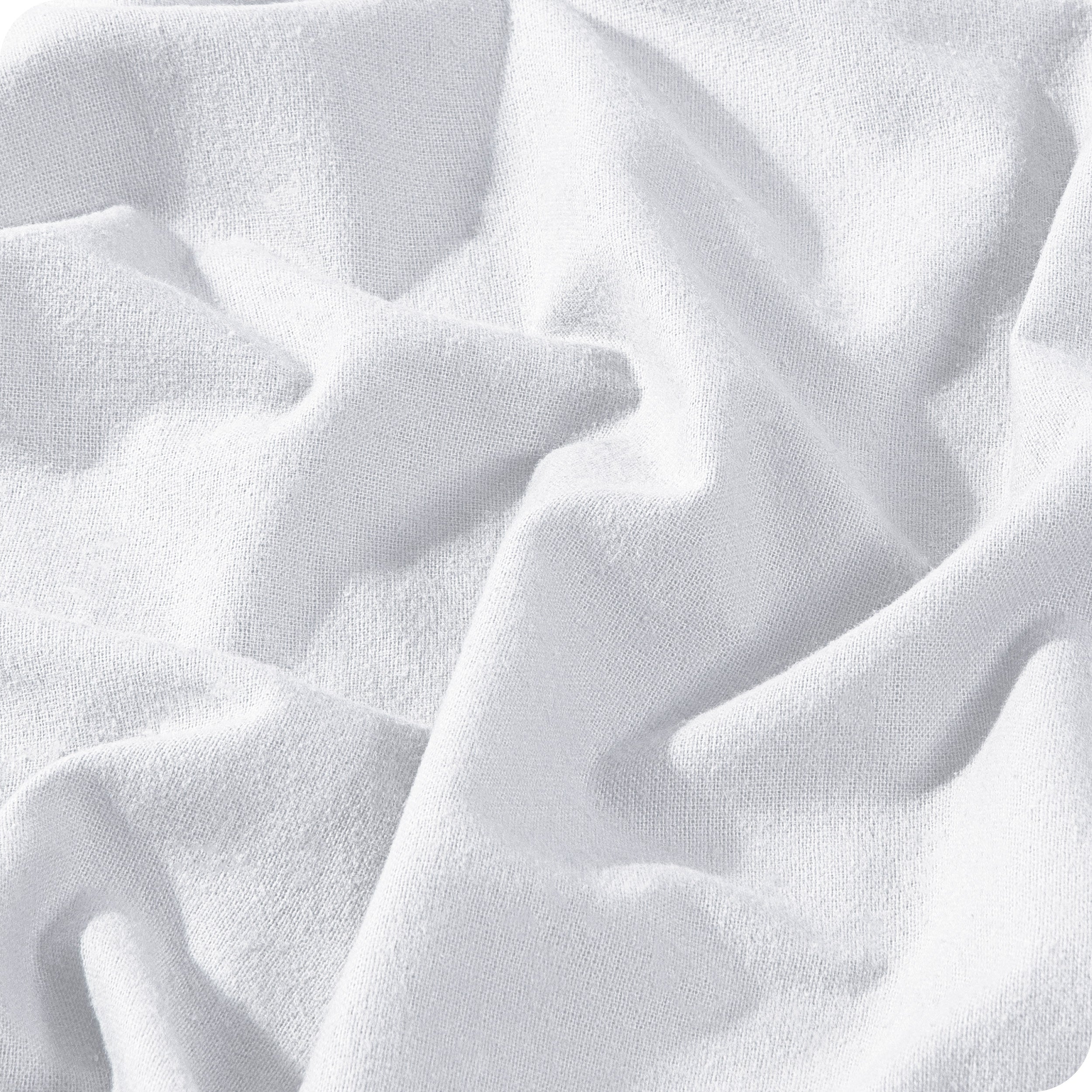 A close view of a button and lining on the flannel duvet cover.