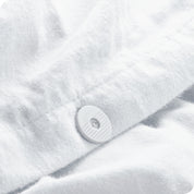 A close up of the tie corner of the duvet cover.