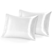 Two silk pillowcases on pillows