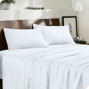 Modern bedroom with organic cotton sateen sheets on the bed