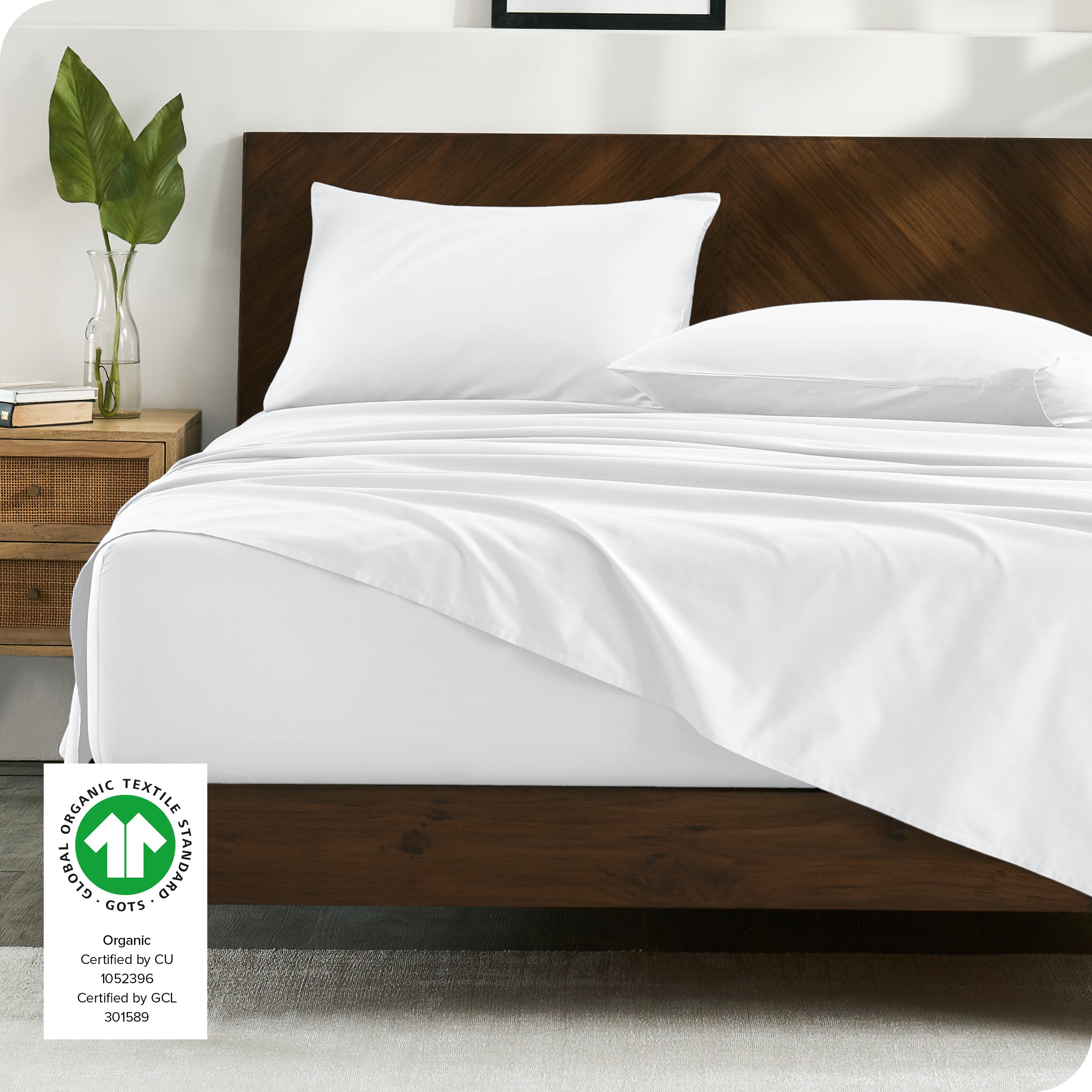 Modern bedroom with organic cotton sateen sheets on the bed