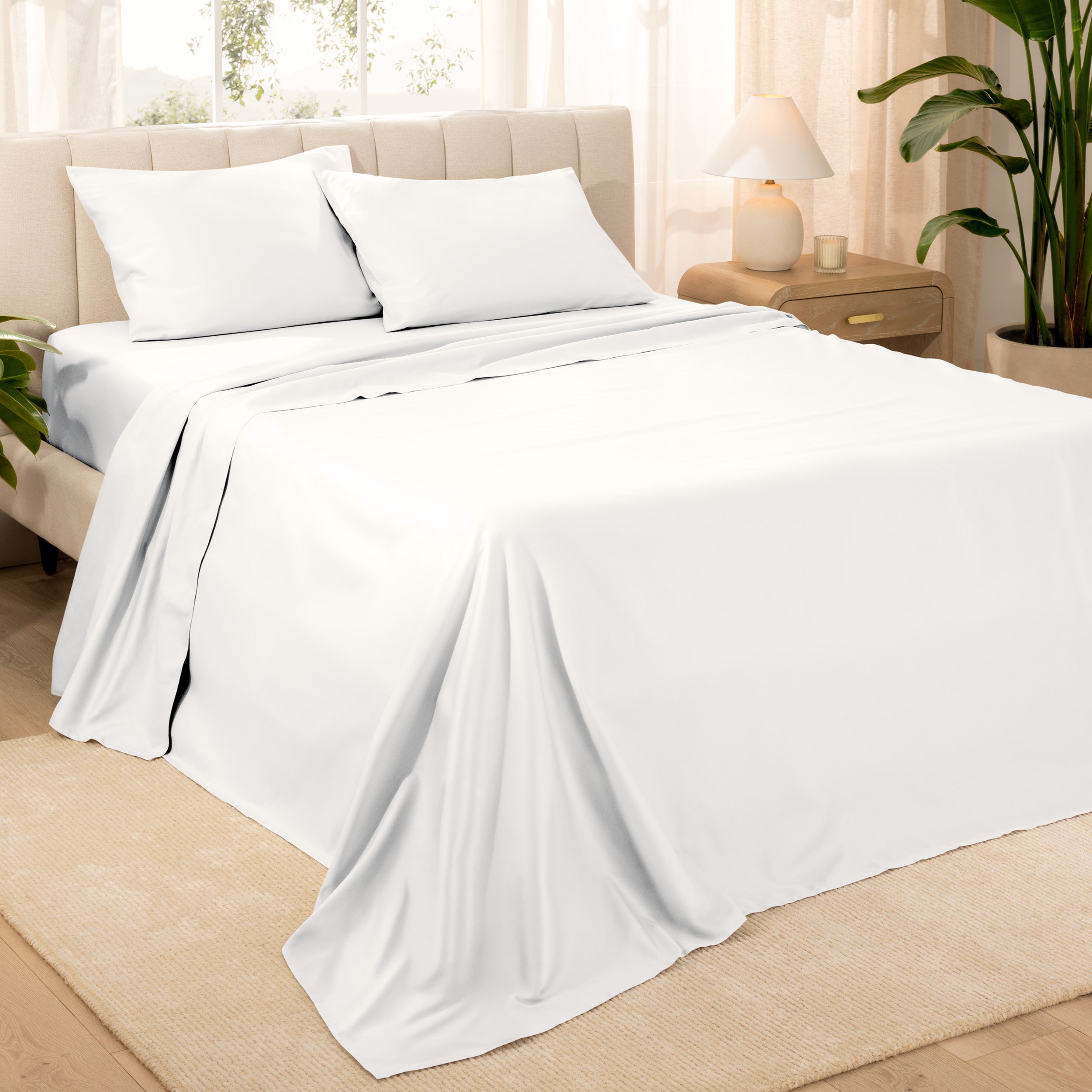 Diagonal view of a decorated room scene with sateen sheets
