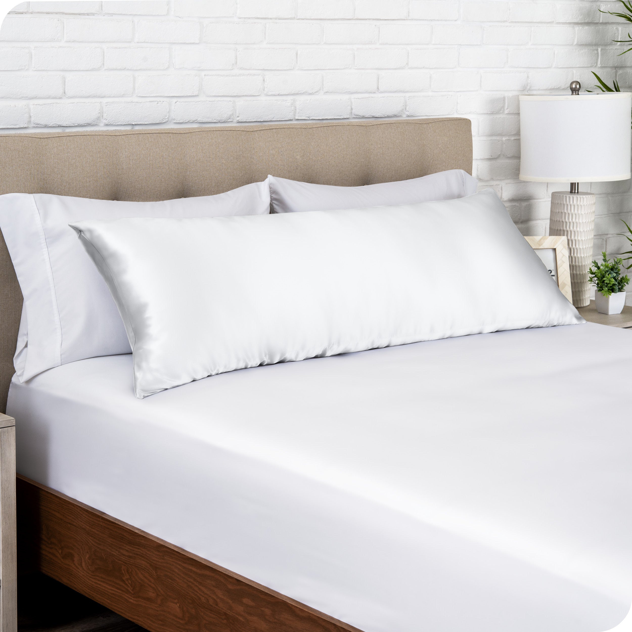 A satin body pillowcase on a pillow