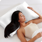 A woman sleeping on a silk pillowcase