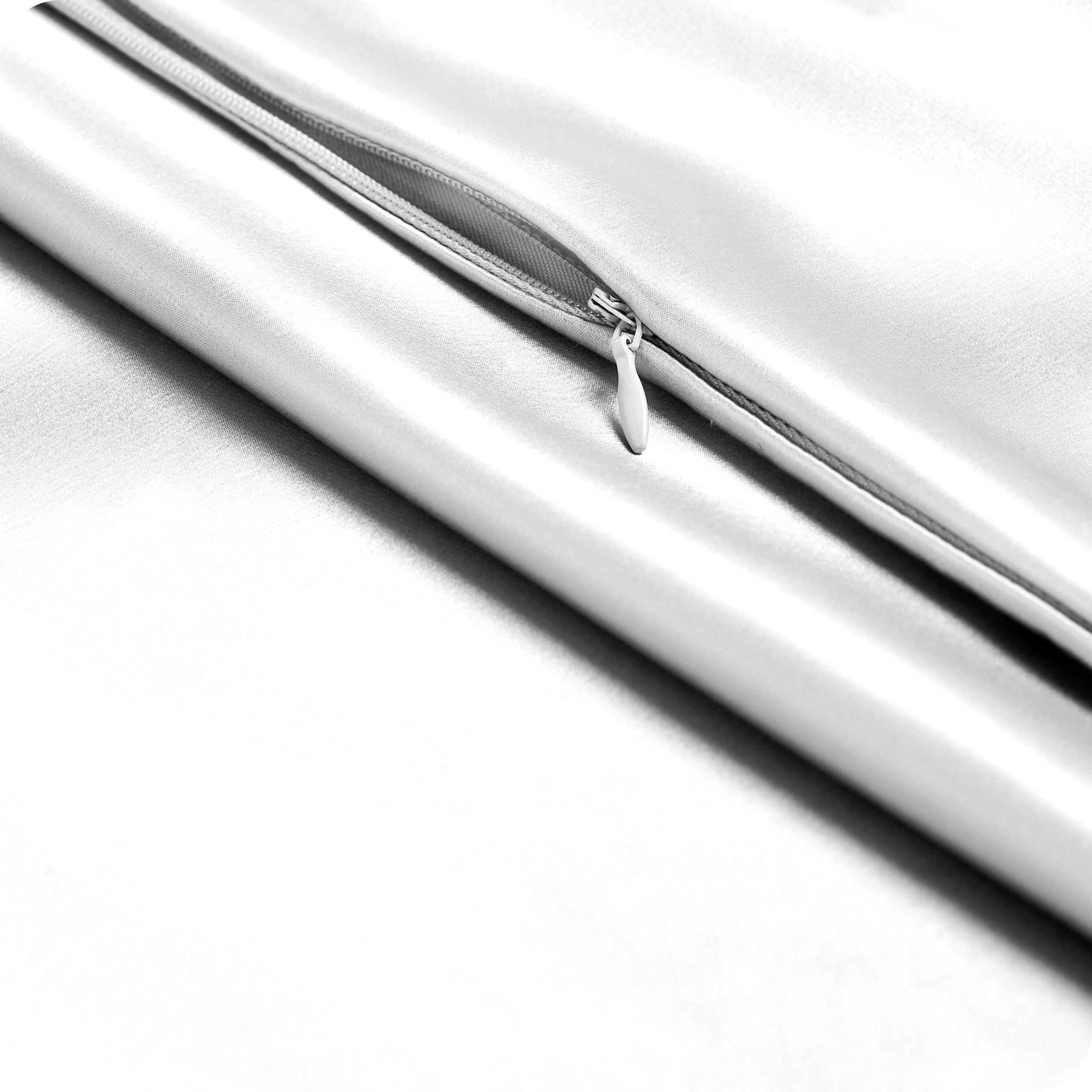 Zipper on a satin pillowcase