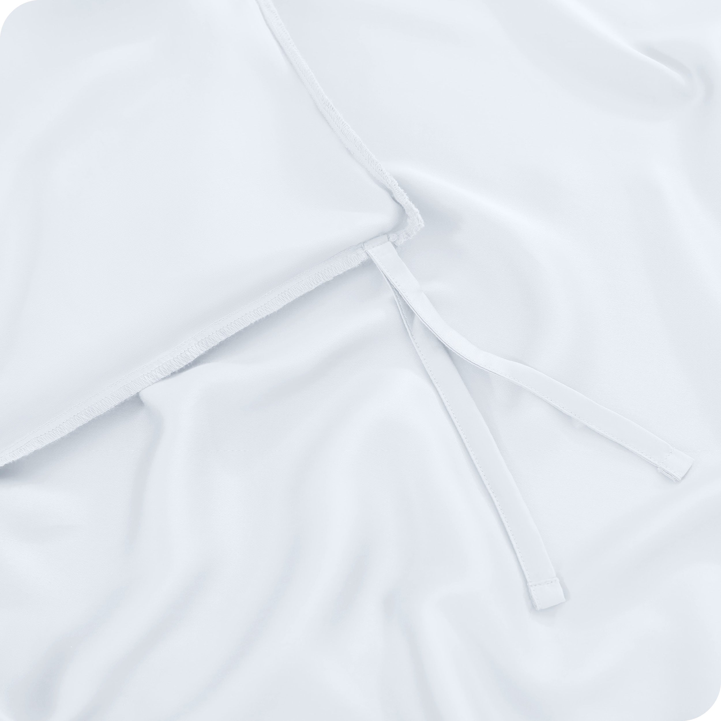 Close up of the corner ties on a TENCEL™ duvet cover