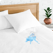 A glass of water spilled on a mattress protector