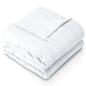 A cotton weighted blanket folded neatly