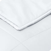 Close up of the stitching on a cotton weighted blanket