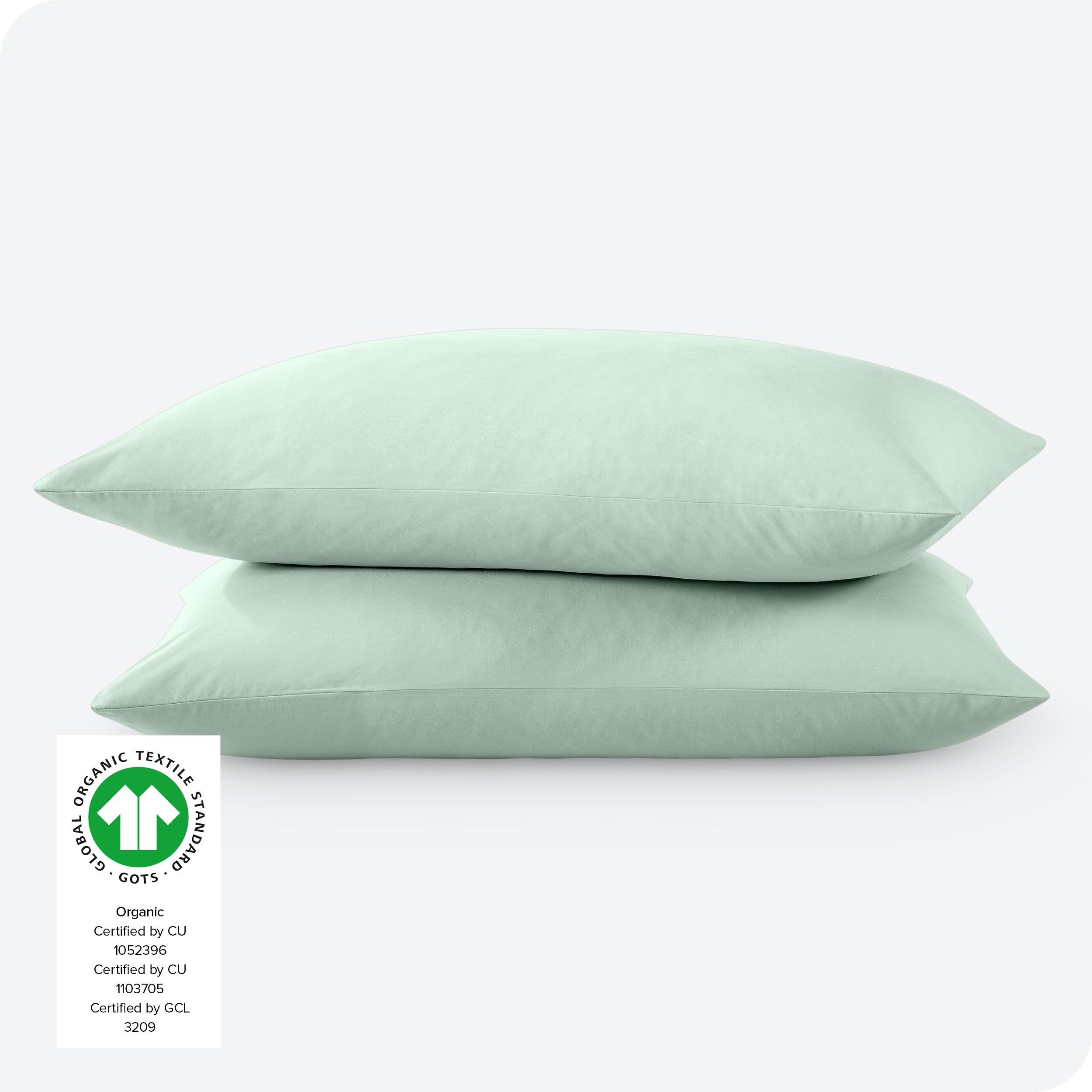 2 percale pillowcases on pillows set on a white background