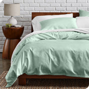 A modern bed with a organic cotton percale duvet cover on.