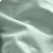 A close view of the oraganic cotton percale duvet cover showing the texture, color, and fabric.