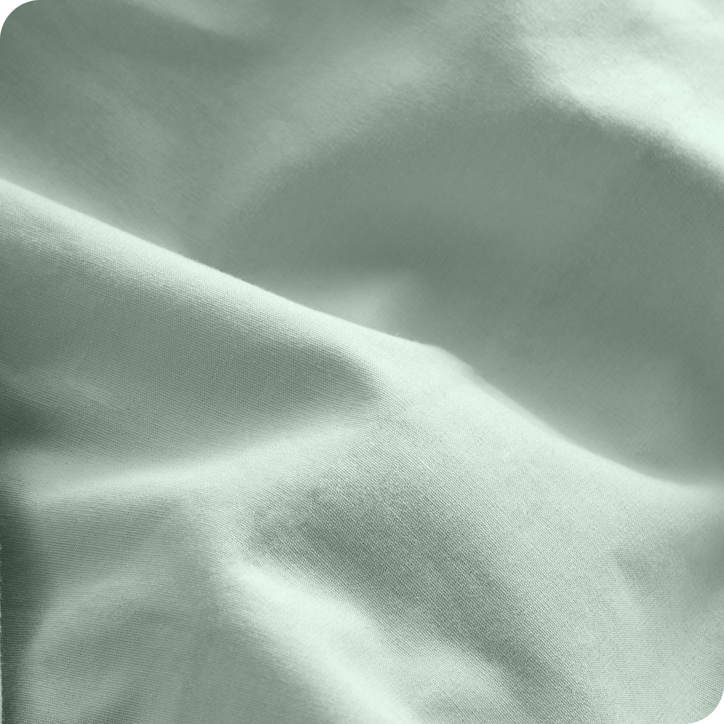 A close view of the oraganic cotton percale duvet cover showing the texture, color, and fabric.