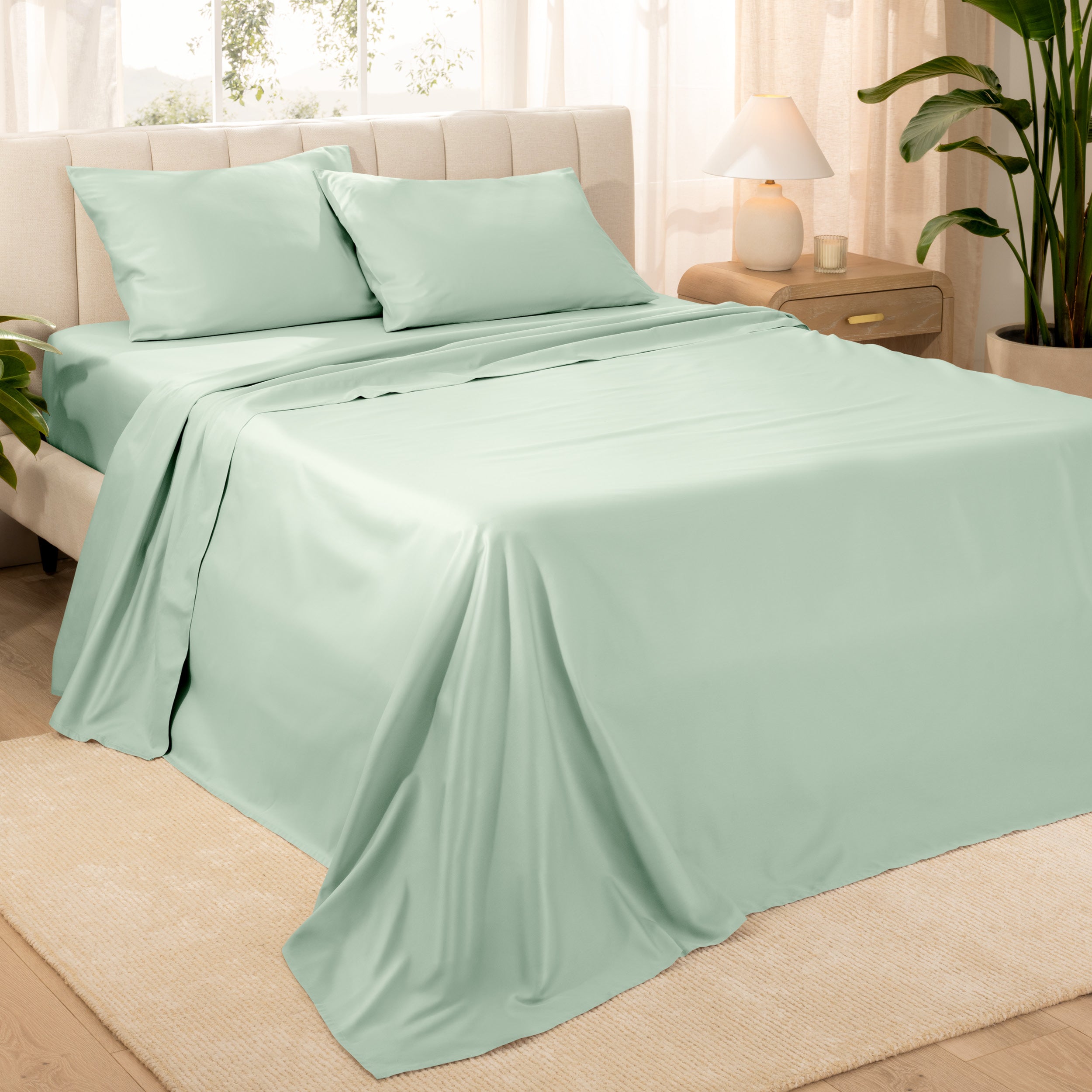 Diagonal view of a decorated room scene with sateen sheets