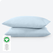 2 percale pillowcases on pillows set on a white background