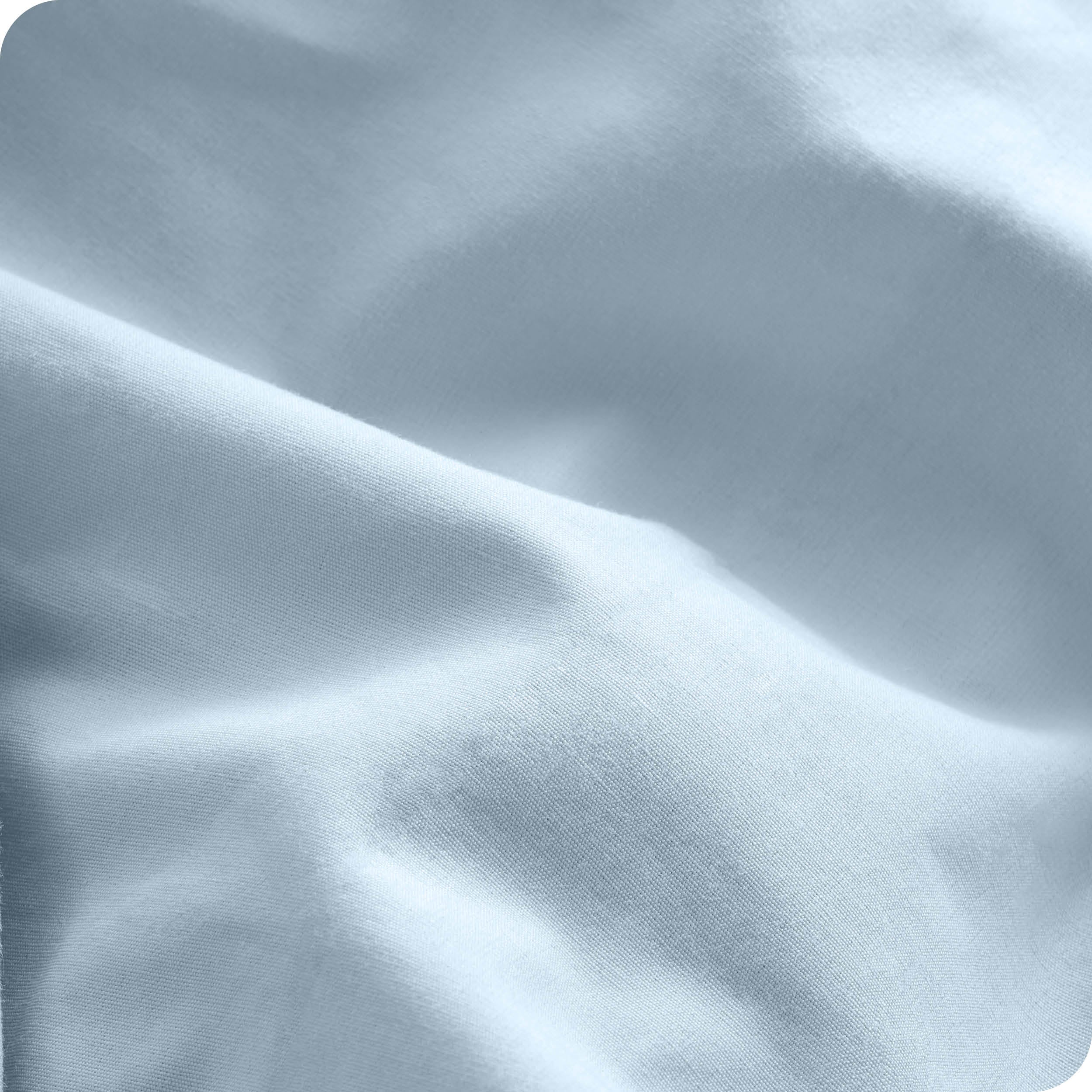 A close view of the oraganic cotton percale duvet cover showing the texture, color, and fabric.