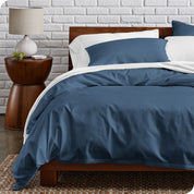 A modern bed with a organic cotton percale duvet cover on.