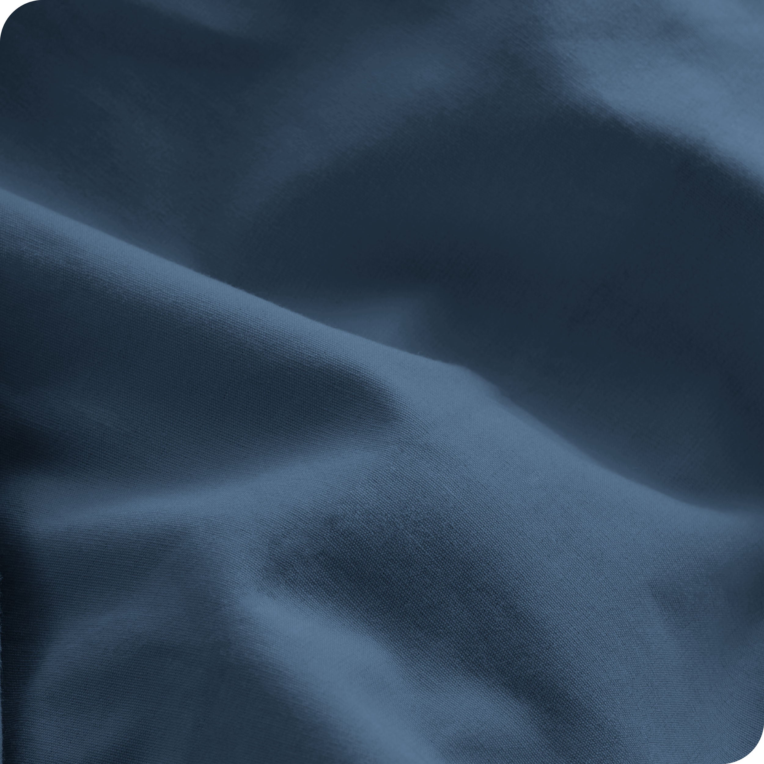 A close view of the oraganic cotton percale duvet cover showing the texture, color, and fabric.
