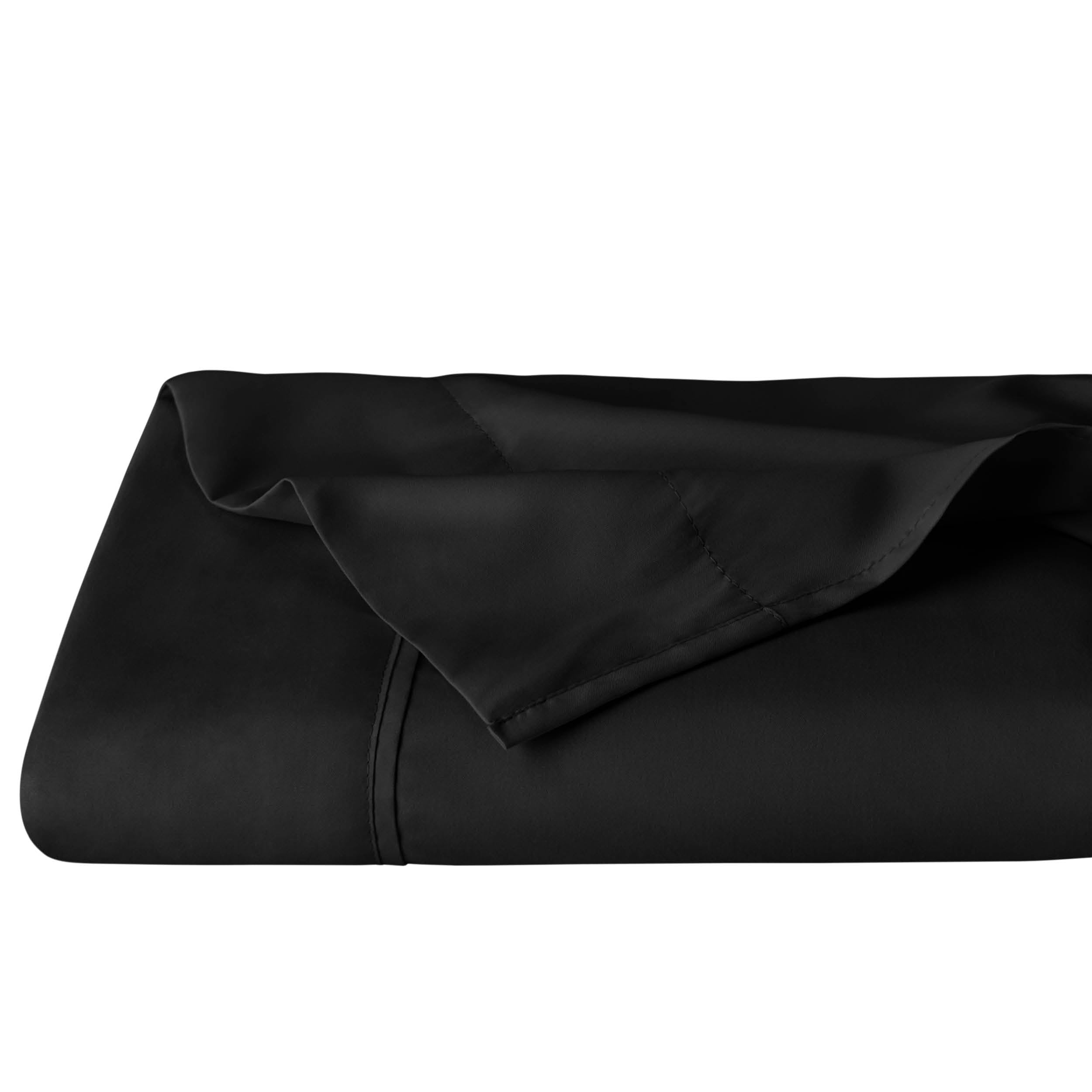 A folded black microfiber flat sheet.